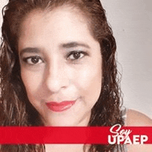 a close up of a woman 's face with red lipstick and a red border .