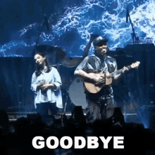 a man playing a guitar and a woman singing in front of a crowd with the words goodbye below them