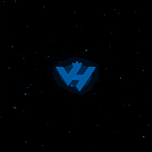 a blue letter w with a crown on top of it