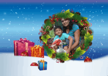 a woman holding a child in front of a christmas wreath with presents in the background