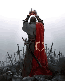 a man in a red cape holds a crown above his head