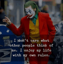 the joker is wearing a red suit and a yellow vest