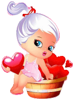 a little girl is sitting in a bucket of hearts