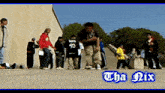 a group of skateboarders are lined up in front of a wall with the words tha nix on the bottom