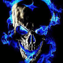 a skull with blue flames coming out of it 's mouth .