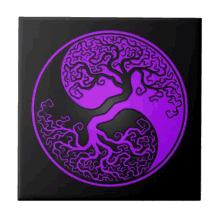 a purple and black tree of life is in a circle on a black tile .