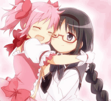 two anime girls are hugging each other and one has glasses on