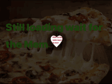 a pizza with the words still loading wait for the meme