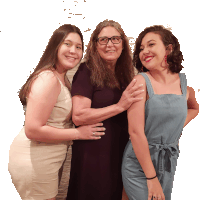 three women are posing for a picture and one is wearing glasses