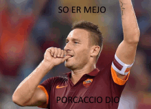 a soccer player with the word porcaccio dio on the front of his shirt