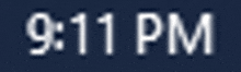 a blurred image of the word 9:11 pm on a dark blue background