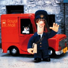 a cartoon postman is standing in front of a royal mail truck .