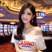 a woman in a white shirt that says casino museumbola