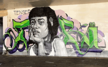 a mural of a woman with the word tensep on the wall