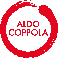 a red circle with the words aldo coppola inside