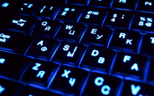 a close up of a keyboard with the letters z a x and y visible