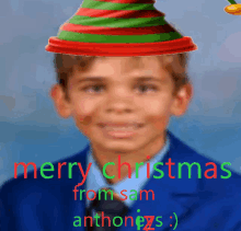 a picture of a boy wearing an elf hat with the words merry christmas from sam anthonyzs