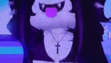 a close up of a cartoon character wearing a cross necklace and sticking its tongue out .