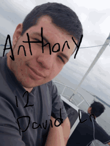 a young man with the name anthony written on his face