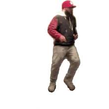 a man in a red and white hat is dancing on a white background