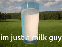 a glass of milk in a field with the words i 'm just a milk guy