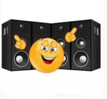 a yellow smiley face is standing in front of speakers .