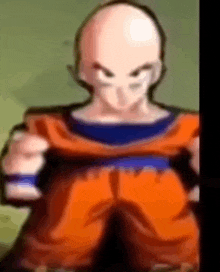 a cartoon character with a bald head and orange pants is standing in front of a green background .