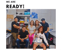 a group of people are posing for a picture with the words we are ready