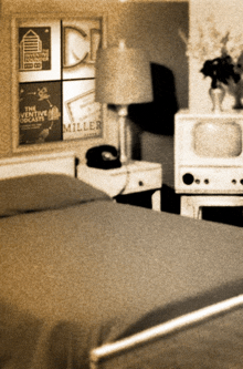 a black and white photo of a bedroom with a poster on the wall that says the narrative podcasts