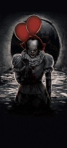 pennywise the clown is holding two red balloons