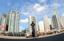 a man is riding a scooter in front of a city skyline and the words awesome are on the bottom