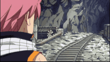 a cartoon character with pink hair is looking at a train track