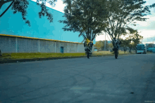 a photo of two people riding motorcycles taken by eddymer r.