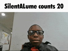 a picture of a person with glasses and the words silentalume counts 20