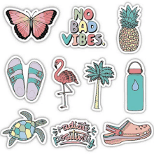 a bunch of stickers including a flamingo a butterfly a turtle a pineapple and a water bottle