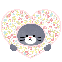 a cat is sitting inside of a heart with flowers around it