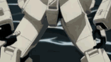 a close up of a robot 's legs in an anime scene .