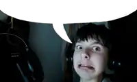 a man wearing headphones is making a funny face with a speech bubble above him