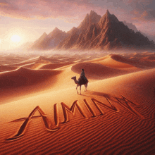 a man on a camel in the desert with the word amina written in the sand