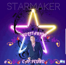 a man in a suit stands in front of a star that says starmaker