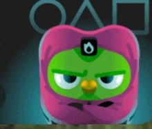 a green cartoon character wearing a pink hat with a flame on it