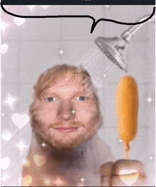 a man with a beard is taking a shower with a shower head and holding a hot dog