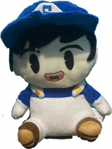 a stuffed toy with a blue hat and a letter a on it