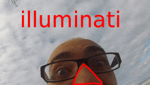 a man wearing glasses and a red triangle on his nose stands in front of the word illuminati