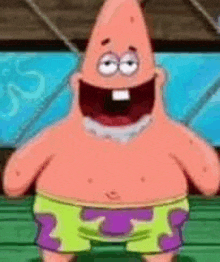 patrick star is a cartoon character from spongebob squarepants wearing purple and yellow shorts and smiling .