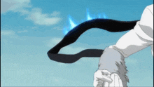 a man in a white cape is flying through the air holding a sword