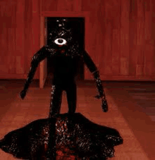 a black monster with a large eye is standing in a room .