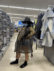 a woman wearing a mask stands in a store with a sign that says mas ho