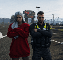 a woman in a red sweater stands next to a police officer in front of a sign that says duty boundence position