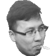 a man with glasses is smoking a cigarette .